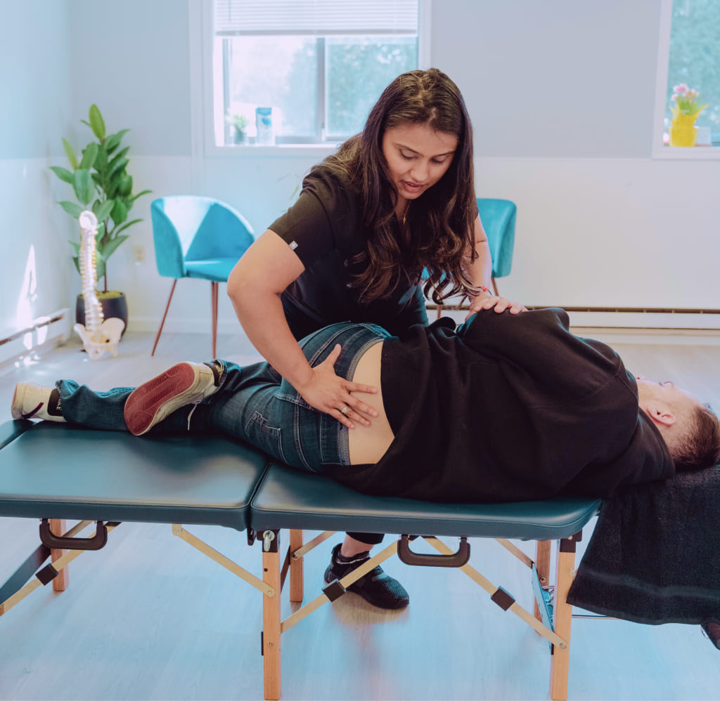 Dr. Patel performing a chiropractic adjustment